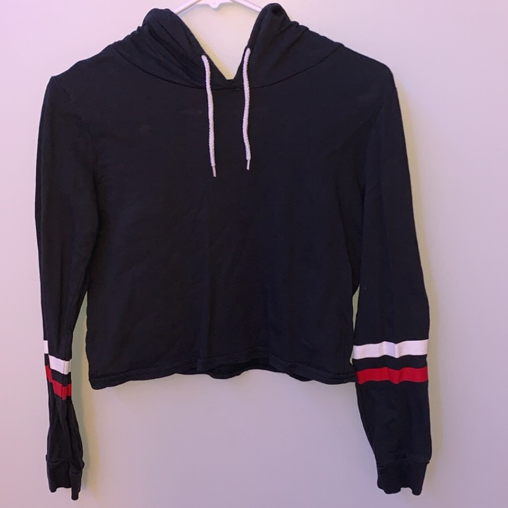black, red, and white cropped hoodie